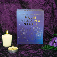Gift Republic Palm Reading Night verpakking met kaarsjes op paarse achtergrond.