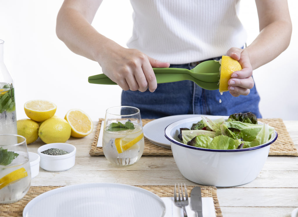 Peleg Design Citruspers en saladebestek 2-in-1 Juicepair