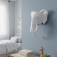 Assembli 3D-puzzel olifantenkop wanddecoratie in grijsaan muur in kinderkamer