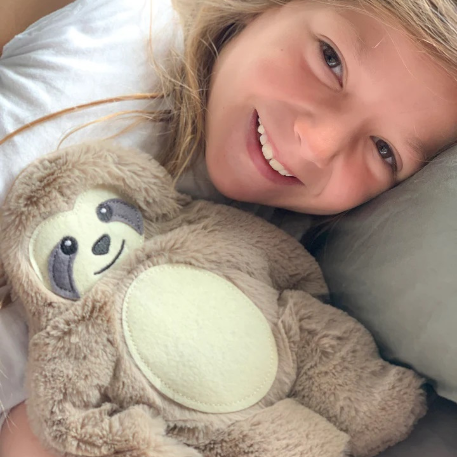 Bitten Huggable warmte kussen Luiaard foto met kind