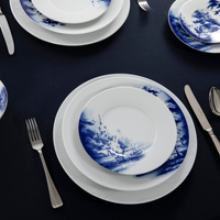 Sfeervol-gedekte-tafel-met-Royal-Delft-Dutch-Dawn-servies