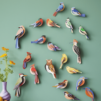 Studio Roof  vogels aan de muur